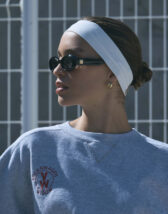 Le Specs Work It! Black Sunglasses on face lifestyle image
