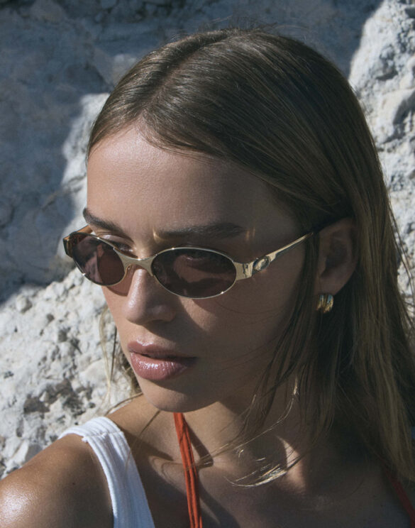 Le Specs Frostbite Bright Gold Sunglasses Lifestyle Beach Image