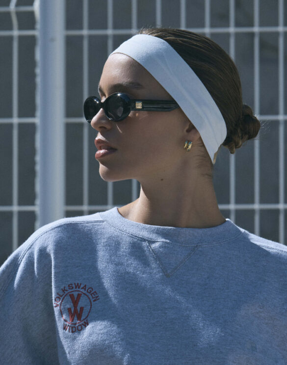 Le Specs Work It! Black Sunglasses on face lifestyle image